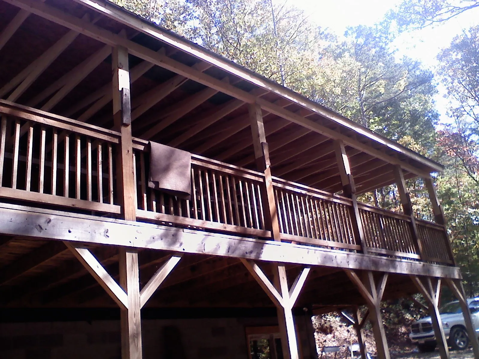 Timber framing under a new elevated porch and deck — Roof Leak Repair in Mission Hills by Roofing Brothers